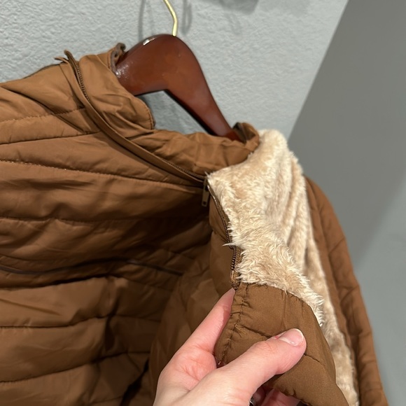 A Brown Puffer Jacket with tightness Adjustability and a removable hoodie. - Picture 5 of 5